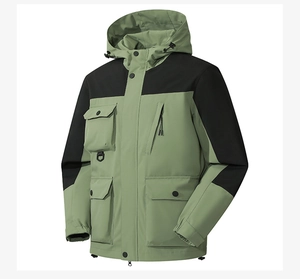 Detail view of the waterproof hooded jacket featuring utility pockets and drawstrings