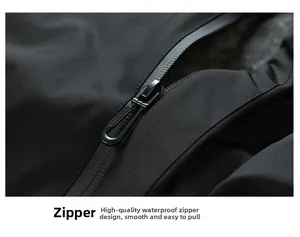 Detail view of high-quality waterproof glued zipper on black outdoor jacket fabric