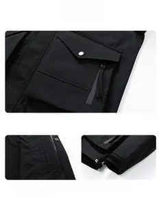 Detail view of waterproof zippers, mesh lining, and adjustable cuffs on a black jacket