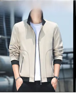 Detail of light khaki jacket with black ribbed collar and premium metal zipper closure