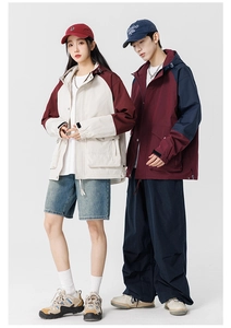 Outdoor color-block jackets featuring adjustable hoods and functional flap pockets for couples