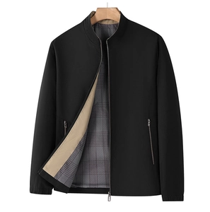Detail of men's business jacket showing gray plaid lining and interior zipper pocket