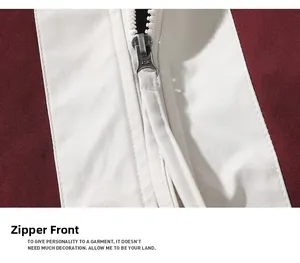 Detail of metal zipper head with JSK logo on burgundy and white casual jacket