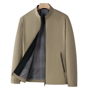 Detail of business casual stand collar jacket featuring khaki anti-wrinkle fabric and grey plaid lining