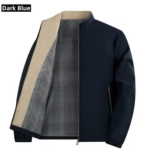 Detail of navy blue business jacket showing standing collar and grey plaid lining