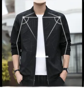 Detail view of men's slim fit black bomber jacket with ribbed cuffs and geometric texture