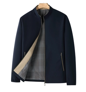 Detailed view of dark blue standing collar jacket with beige plaid lining and zipper pocket