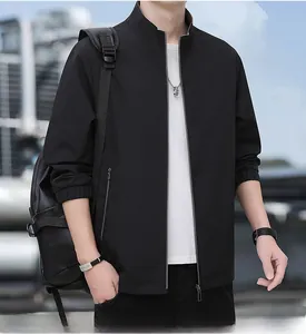 Close-up of black stand-collar business casual jacket with premium matte texture and zipper