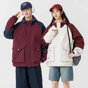 Outdoor hooded windbreaker jacket with color-block patchwork and functional pockets