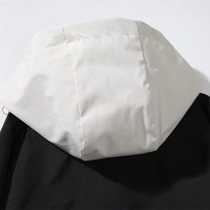 Men's casual jacket with hood detail in black and white contrasting minimalist style