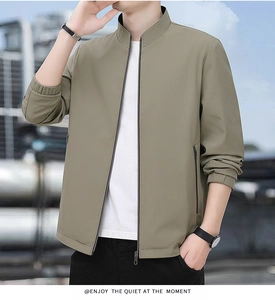 Close-up detail of light khaki men's stand collar business jacket with zipper closure