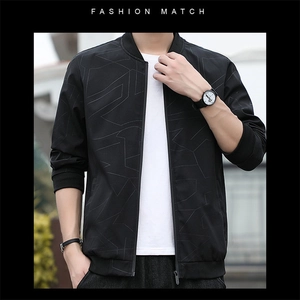 Detail of men's slim black jacket featuring geometric line texture and ribbed cuffs