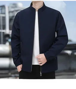 Detail of navy men business jacket with silver zipper and elastic ribbed cuffs