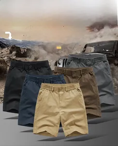 Detailed stack of five men's cotton cargo shorts in various colors with drawstring waist
