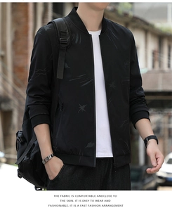 Detail of bomber jacket with star print, ribbed cuffs, and urban streetwear style