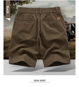 Rear view of brown cotton cargo shorts featuring elastic waist and leather patch detail