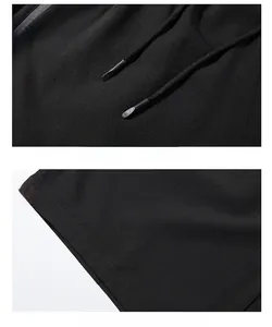 Detail of adjustable drawstring waistband and flat hem on breathable quick-dry shorts