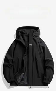 Detail of waterproof outdoor jacket with adjustable hood and functional windproof zippers