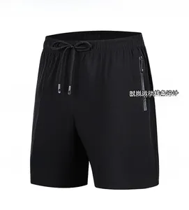 Detail of men's quick-dry sports shorts featuring adjustable drawstring and zipper pocket