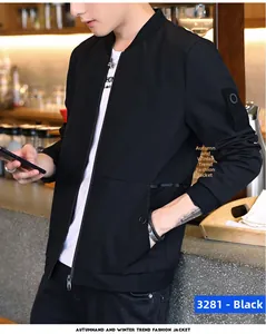 Detail of black baseball jacket with arm patch and ribbed cuffs for men's urban style