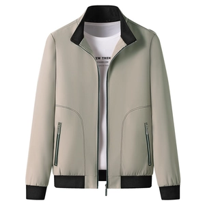 Slim fit men's beige jacket with black ribbed collar and dual zipper pockets