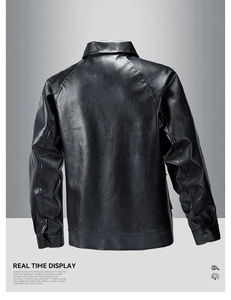 Detailed back view of a black faux leather biker jacket with structural stitching and texture