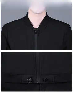 Detail of men's black jacket featuring stand collar, smooth zipper and adjustable drawstring