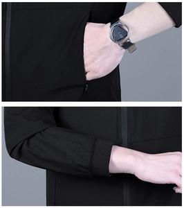 Detail of men's casual windbreaker showing hidden zipper pocket and ribbed elastic cuffs