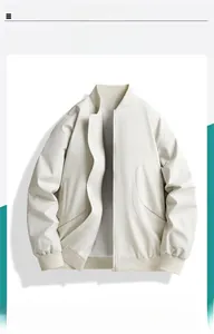 Detail view of the cream white bomber jacket showing ribbed cuffs and zipper closure