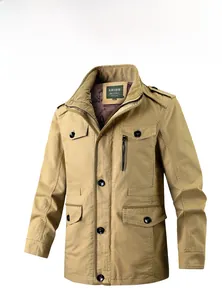Detail view of khaki cotton canvas jacket featuring stand collar and functional utility pockets