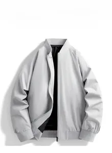 Detailed view of casual light gray bomber jacket with ribbed collar and zipper closure