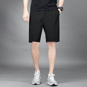 Men's black quick-dry sports shorts with elastic drawstring waist and side zipper pockets