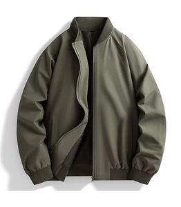 Detail view of olive green bomber jacket featuring ribbed collar and smooth metallic zipper