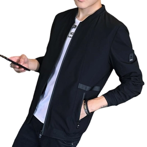 Men's black baseball collar jacket with functional zipper pockets and embroidered arm patch