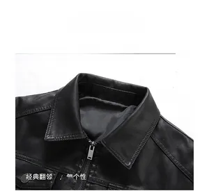 Detail view of the black leather jacket collar featuring a metal zipper and neat stitching