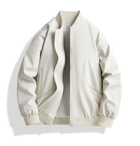 Detailed close-up of premium cream white varsity jacket fabric and ribbed collar detail