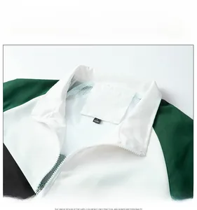Detailed view of breathable mesh lining and zippered collar on the green sports jacket