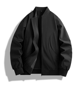 Detailed flat lay of a black bomber jacket with ribbed collar and shoulder drop seam