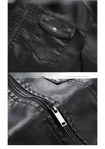Detail of the black leather jacket showing front flap pocket with metal button and zipper