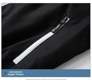Detailed close-up of a black jacket side pocket with a stylish zipper puller and white trim