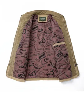 Detail view of khaki corduroy jacket lining with letter print and internal pocket