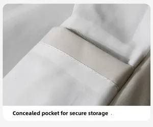 Detail shot of internal hidden security pocket with precise stitching on mountain jacket