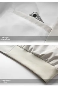 Detail of inner pocket and ribbed hem on a beige casual American baseball jacket