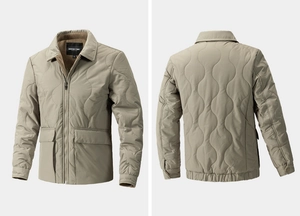 Close-up of khaki quilted men jacket with corduroy collar and wave stitch detail