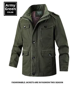 Detailed close-up of military green work jacket featuring epaulettes and utility pockets