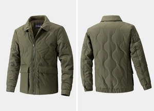 Detail of olive green quilted jacket featuring wave stitching and cargo flap pockets