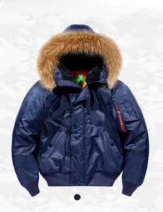 Detail of royal blue MA-1 flight jacket showing detachable fur collar and sleeve tag