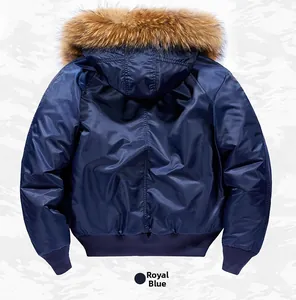 Detail of royal blue MA1 bomber jacket featuring a luxury detachable fur collar