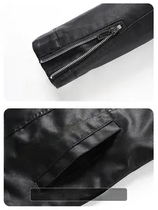 Detail of black leather jacket showing zipper cuffs and large side pockets with stitching