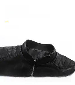 Detail view of motorcycle jacket showing stand-up collar and quilted shoulder stitching